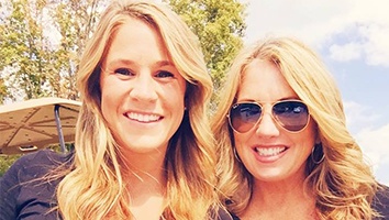 Two women smiling together outdoors