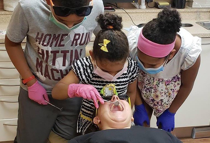Kids treating Drabik Orthdontics team member