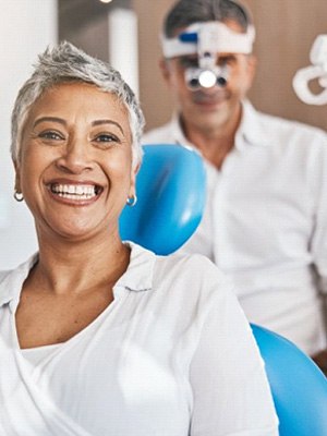 a patient smiling about dental insurance coverage
