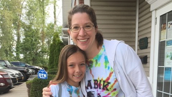 Smiling mother and daughter