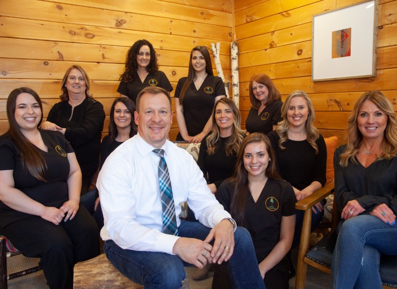 Rochester orthodontist and team members smiling