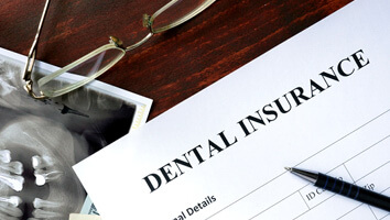 dental insurance form on table