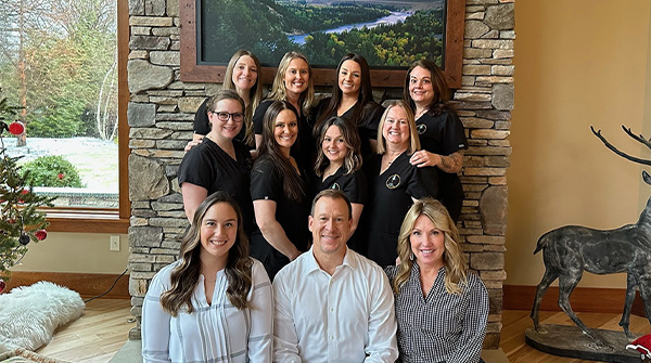 Rochester orthodontist and team members smiling