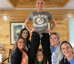 Smiling orthodontic team members in Rochester