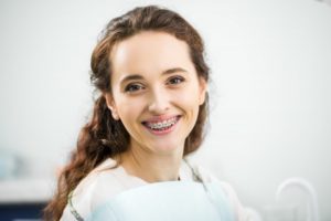 Woman smiling with braces