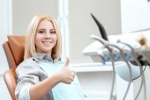 Woman smiling in dental chair during her orthodontic appointment