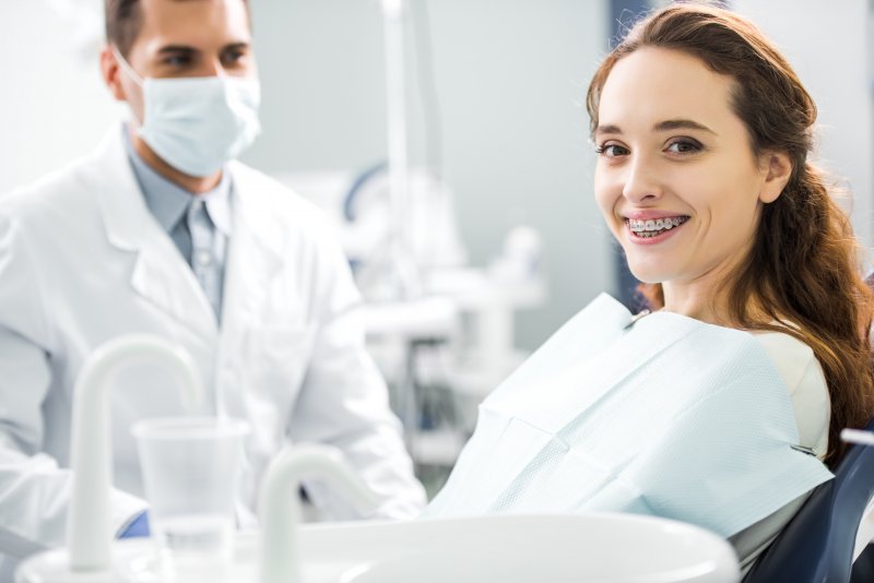 Patient learning the cost of orthodontic treatment from an orthodontist