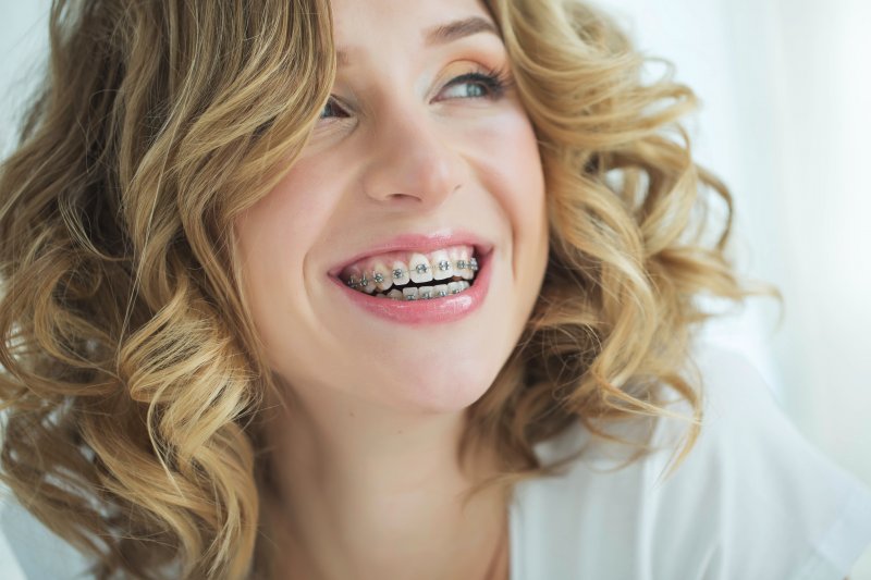 Smiling teen wearing braces